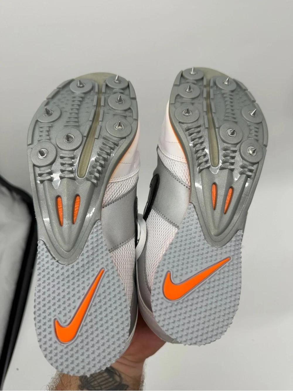 Nike Kids White & Gray Cleats with Orange Lining